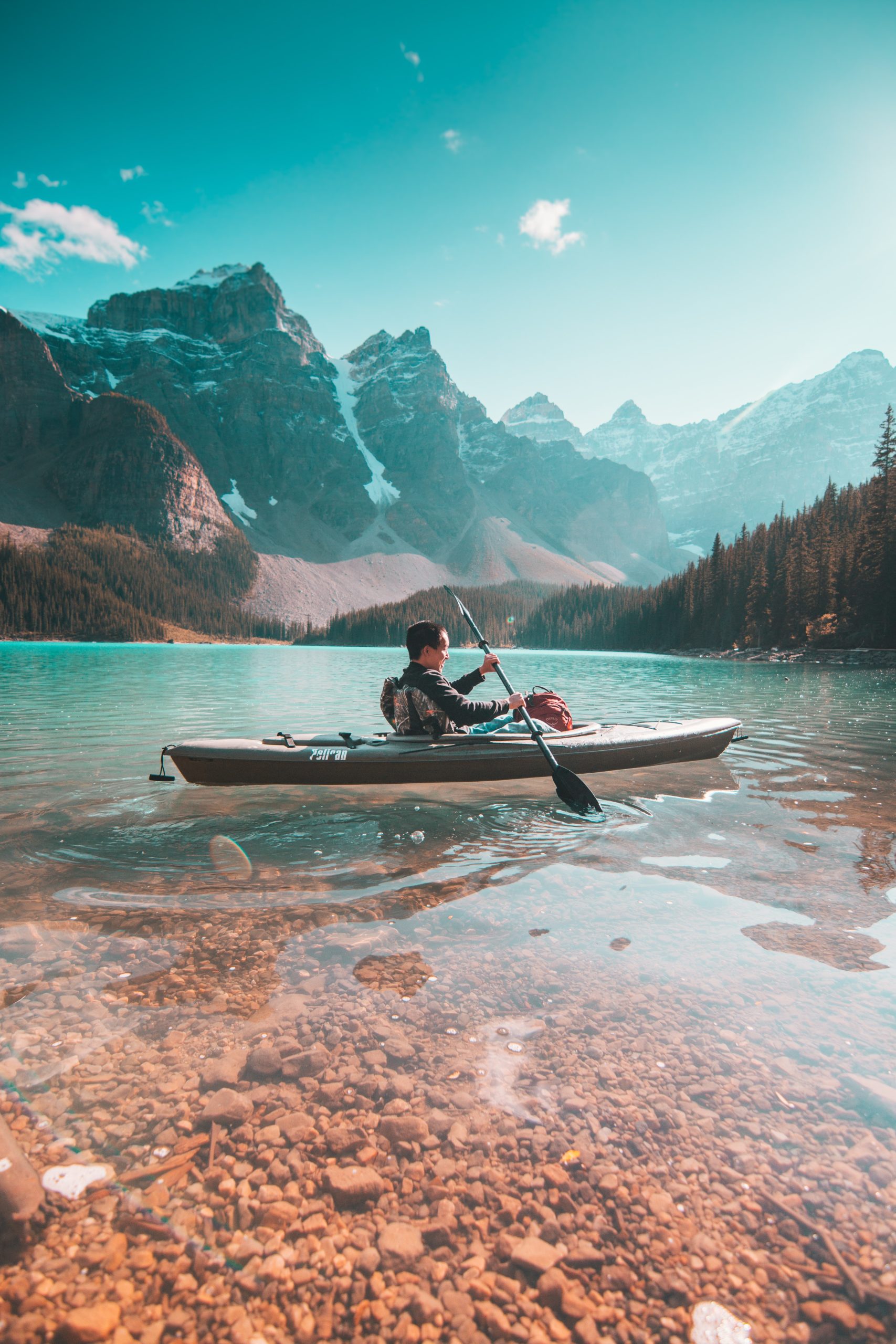 man in an inflatable kayak